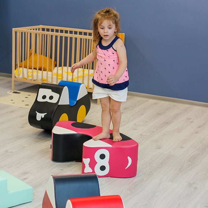 Kind loopt over Soft Play Ride On Toy - Car