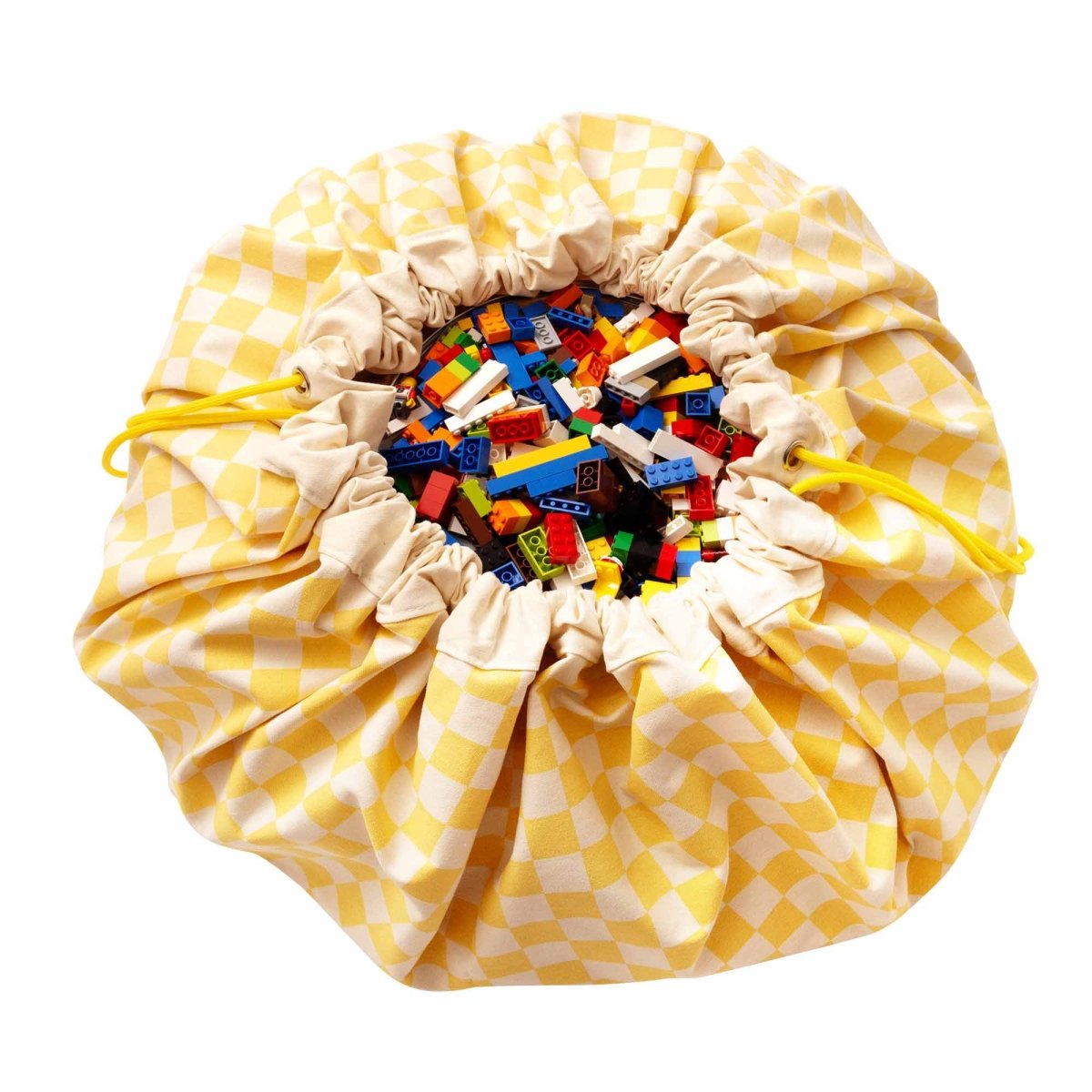 Play&amp;Go Vichy Yellow speelkleed uitgevouwen in een kinderkamer